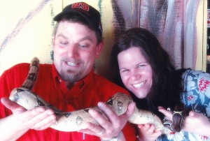 Here Brett and I out-do Kim and Jesse by holding Sally the boa constrictor. We were the obvious winners!